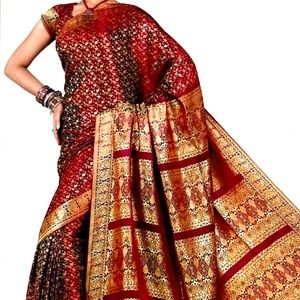 Draped in Royalty The Banarasi Saree Saga Maroon & Gold wedding Sari